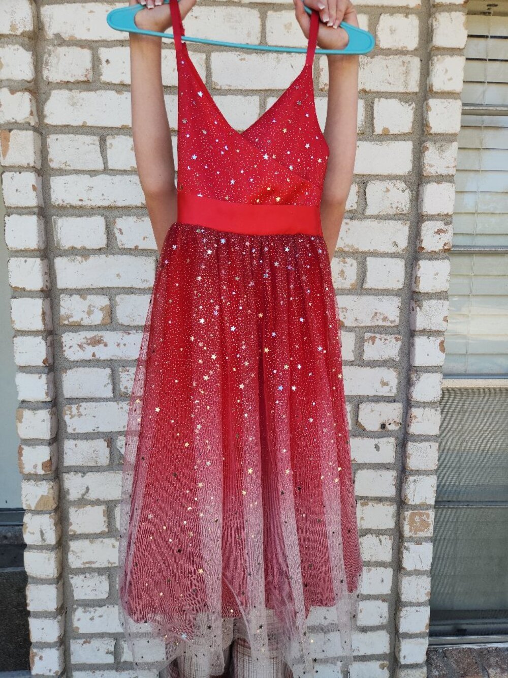 Red sparkly star-patterned dress